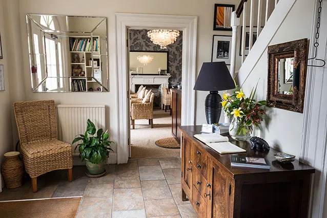 The entrance hall and staircase at Plantation House